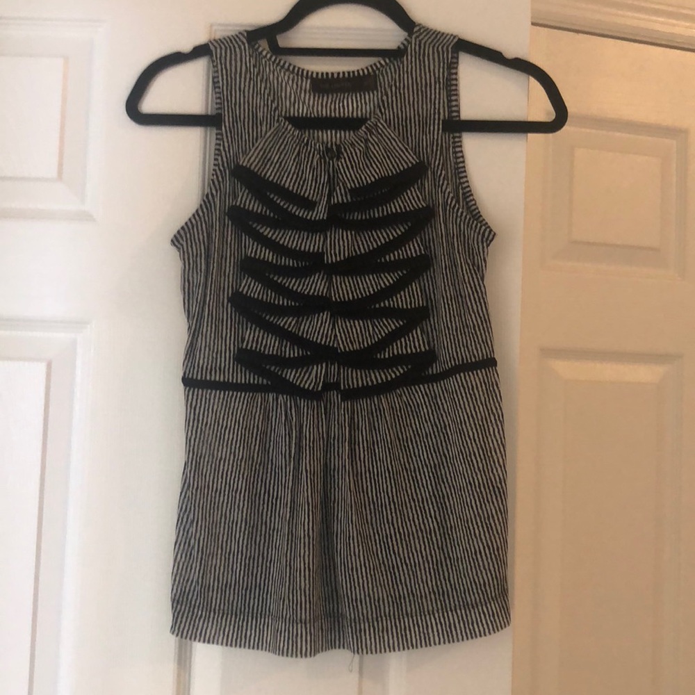 The limited top see through with chest detailing